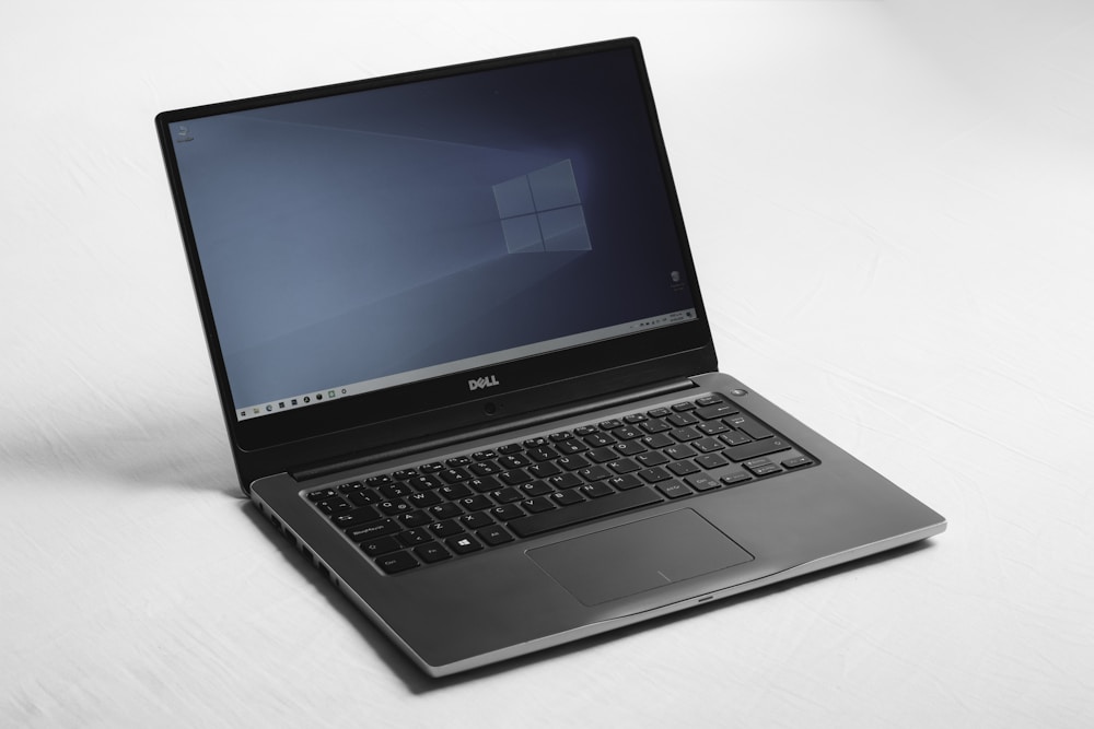 Vệ Sinh & Tra Keo Tản Nhiệt Kim Loại Lỏng PTM7950 Cho Laptop Gaming